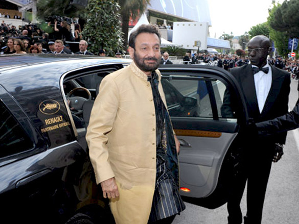 aishwarya rai bachchan and shekhar kapur attends the robin hood premiere at the palais des festivals during the 63rd annual international cannes film festival 3
