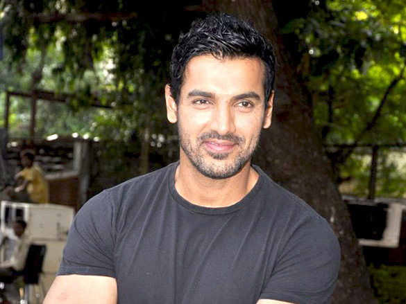 john abraham lifts a bike at force promotions 12