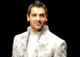 John invests in a motor-racing team