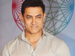 Aamir Khan Reacts To Shah Rukh Khan’s Dig On PK’s Nude Poster