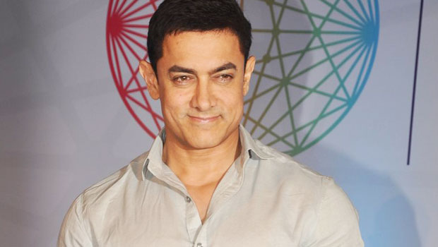 Aamir Khan Reacts To Shah Rukh Khan’s Dig On PK’s Nude Poster