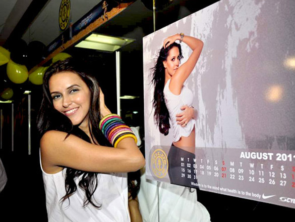 neha dhupia launches golds gym 2011 calendar 7