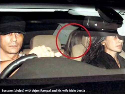 Sussanne ducks in Arjun’s car to avoid cameras