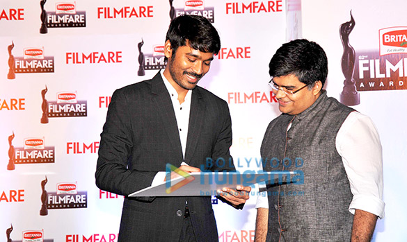 dhanush at the 62nd britannia filmfare south awards special award issue launch at the leela palace 6
