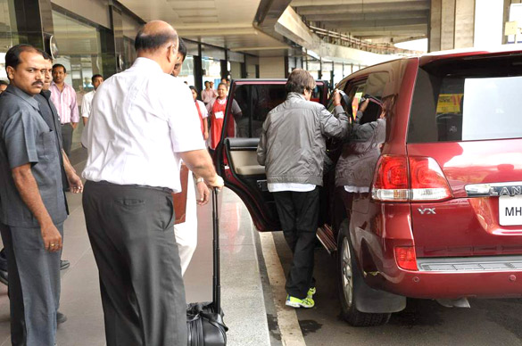 big b snapped in green florescent sports shoes 9