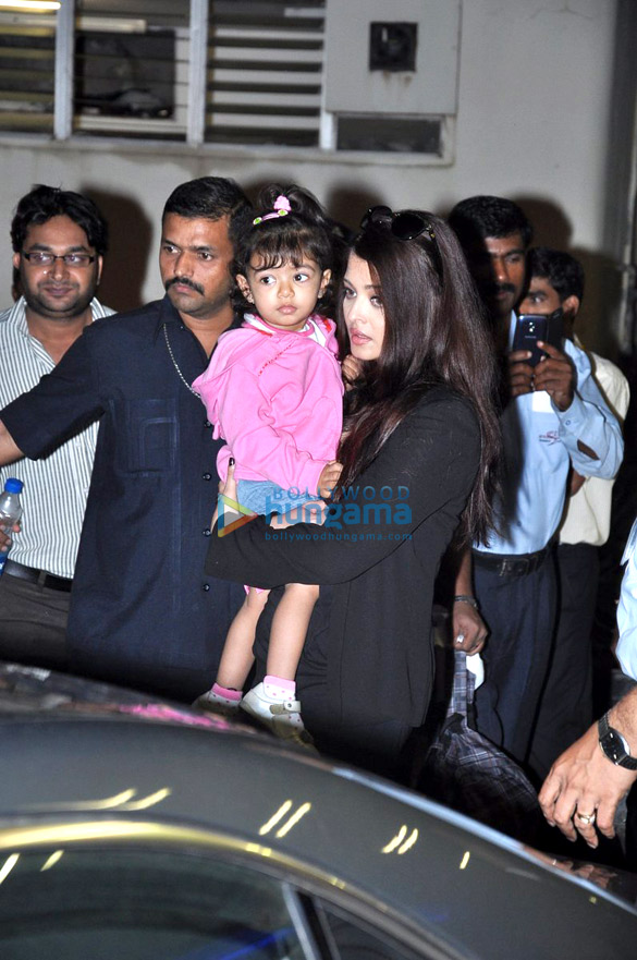 abhishek receives aishwarya as she arrives from london 7