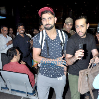 Virat Kohli snapped at the airport arriving from Delhi