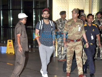 Virat Kohli snapped at the airport arriving from Delhi