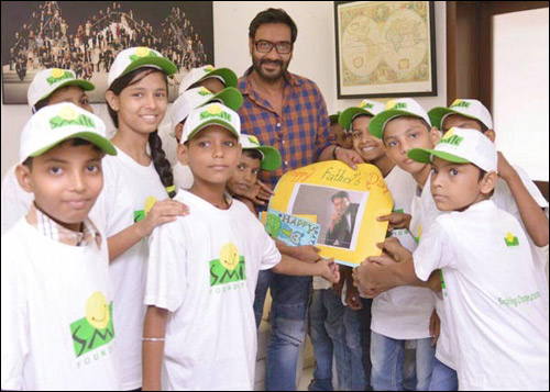check out ajay devgn celebrates fathers day with kids from smile foundation 2
