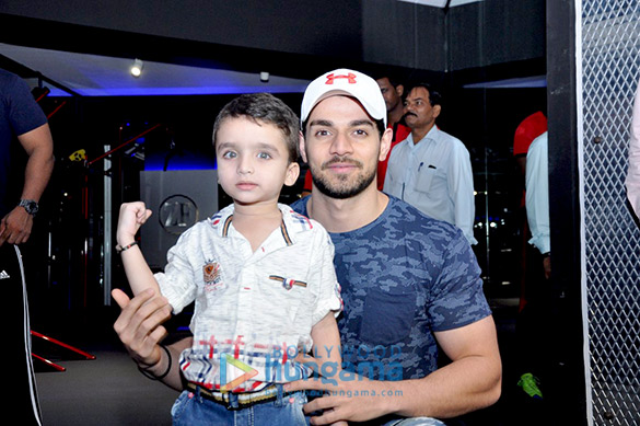 sooraj snapped with a kid fan at gym launch 3