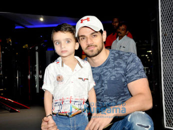 Sooraj Pancholi snapped with a kid fan at Gym launch