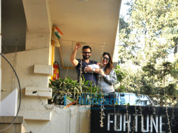 Saif Ali Khan and Kareena Kapoor Khan pose with baby Taimur outside their residence