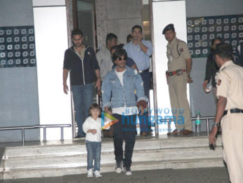 Shah Rukh Khan arrives with AbRam from 'Raees' promotions in Ahmedabad