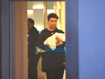 Karan Johar snapped taking his twins Yash & Roohi home