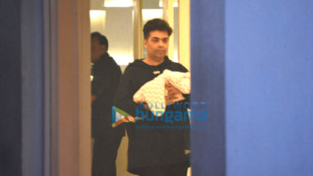 Karan Johar snapped taking his twins Yash & Roohi home