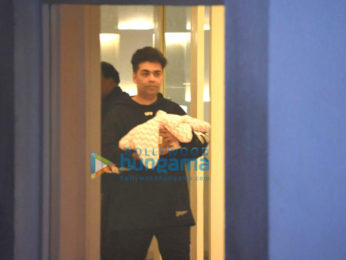 Karan Johar snapped taking his twins Yash & Roohi home