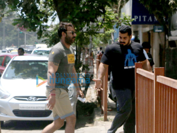 Ajay Devgn snapped as he enters a gym in Juhu