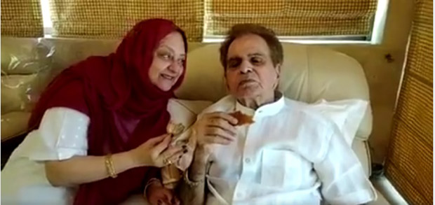 Saira Banu plants a sweet kiss on Dilip Kumar's cheek while having a cup of tea