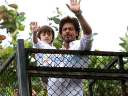SPOTTED: Shah Rukh Khan and his adorable bundle of joy AbRam wave to fans, wishing them on Eid