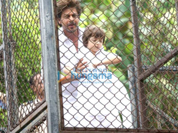 Shah Rukh Khan and his AbRam Khan snapped at their house Mannat on Eid today