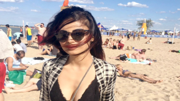 WOW! Mouni Roy looks hot chilling at the beach in this black bikini top