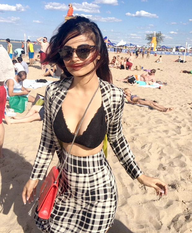 WOW! Mouni Roy looks hot chilling at the beach in this black bikini top (4)