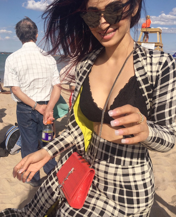 WOW! Mouni Roy looks hot chilling at the beach in this black bikini top (5)