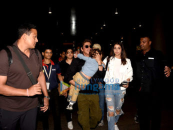 Shah Rukh Khan and Anushka Sharma arrive back from Dubai JHMS promotions