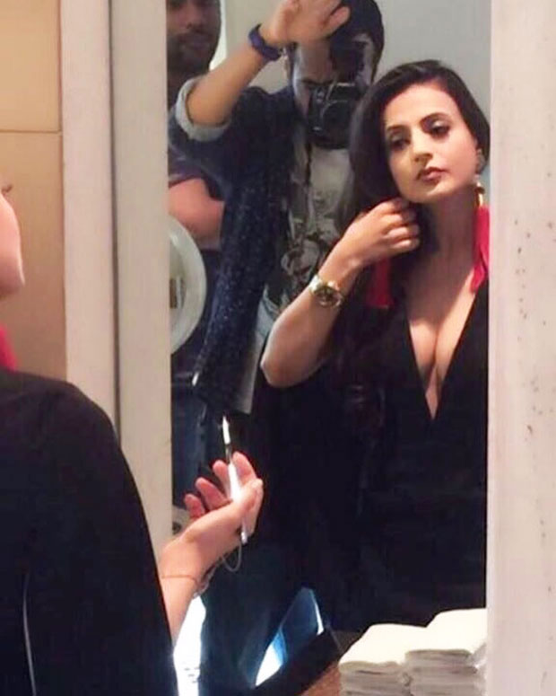 Ameesha Patel shares a picture of her getting ready for a photoshoot