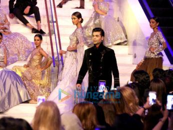 Sidharth Malhotra, Kriti Sanon and Karan Johar walk the ramp for Manish Malhotra's Design One show in Dubai