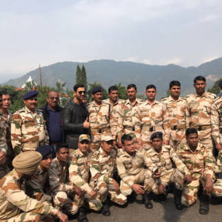 John Abraham happily poses with his ‘true heroes’