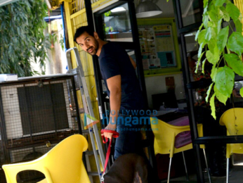 John Abraham snapped with his dog post visiting a Veterinary clinic in Bandra