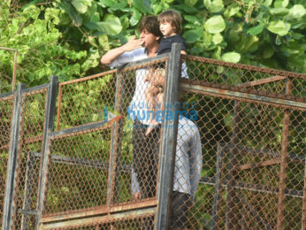 Shah Rukh Khan and Abram snapped waving and wishing fans Eid Mubarak at Mannat