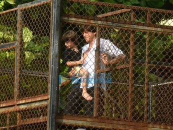 Shah Rukh Khan and Abram snapped waving and wishing fans Eid Mubarak at Mannat