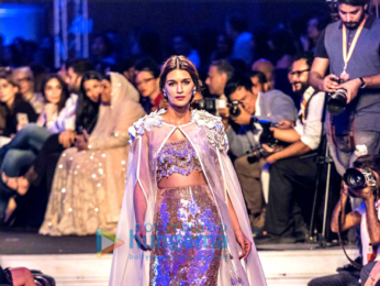 Sidharth Malhotra, Kriti Sanon and Karan Johar walk the ramp for Manish Malhotra's Design One show in Dubai