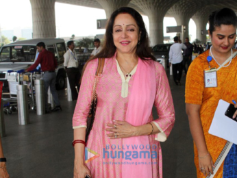 Hema Malini and Angad Bedi snapped at the airport