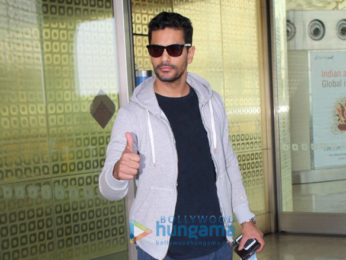 Hema Malini and Angad Bedi snapped at the airport