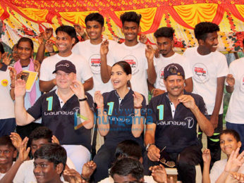Sonam Kapoor and Kapil Dev at an event held by Magic Bus in Dharavi