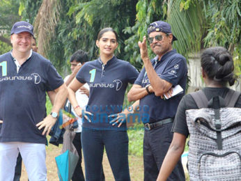 Sonam Kapoor and Kapil Dev at an event held by Magic Bus in Dharavi