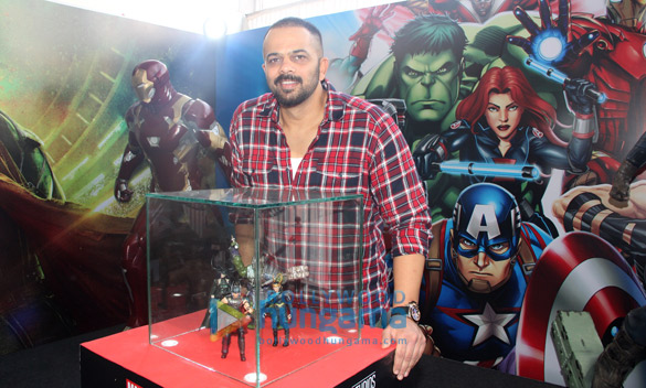 rohit shetty with figurines