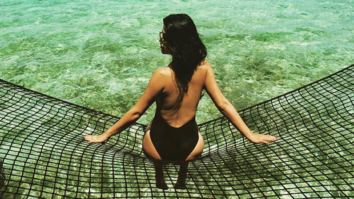 HOT! Shenaz Treasury poses sexily on a fishing net in Maldives