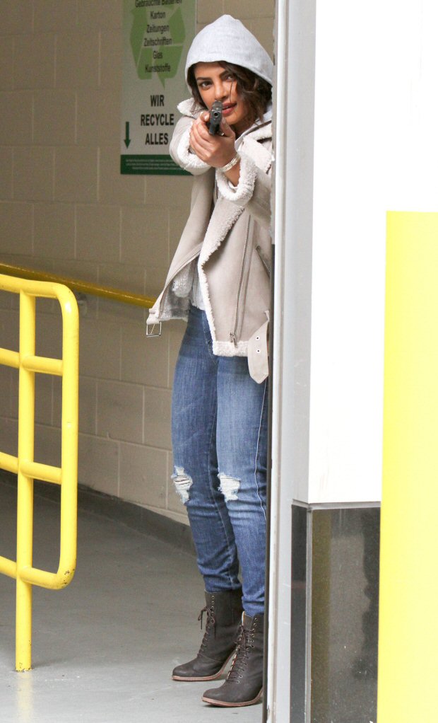 Check out Priyanka Chopra points a gun at someone while shooting an action scene for Quantico on the streets of NYC1