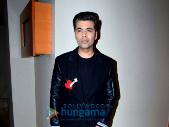 Karan Johar snapped at press meet for Ishq FM