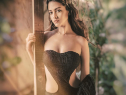 HOT! Riya Sen sizzles in this black swimsuit and she looks as sexy as ever