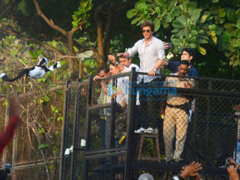 Shah Rukh Khan waves to fans from Mannat on his 52nd birthday