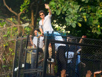 Shah Rukh Khan waves to fans from Mannat on his 52nd birthday