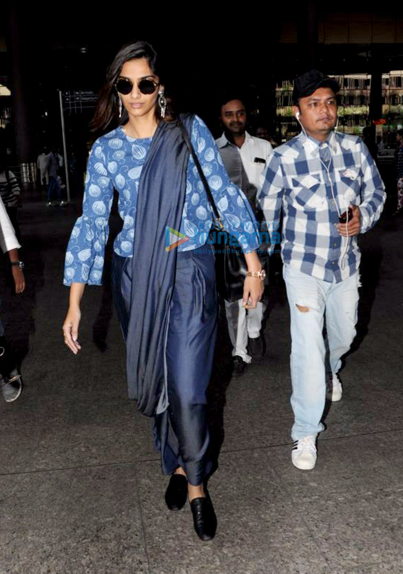 sonam kapoor anand ahuja and govinda snapped at the airport 5