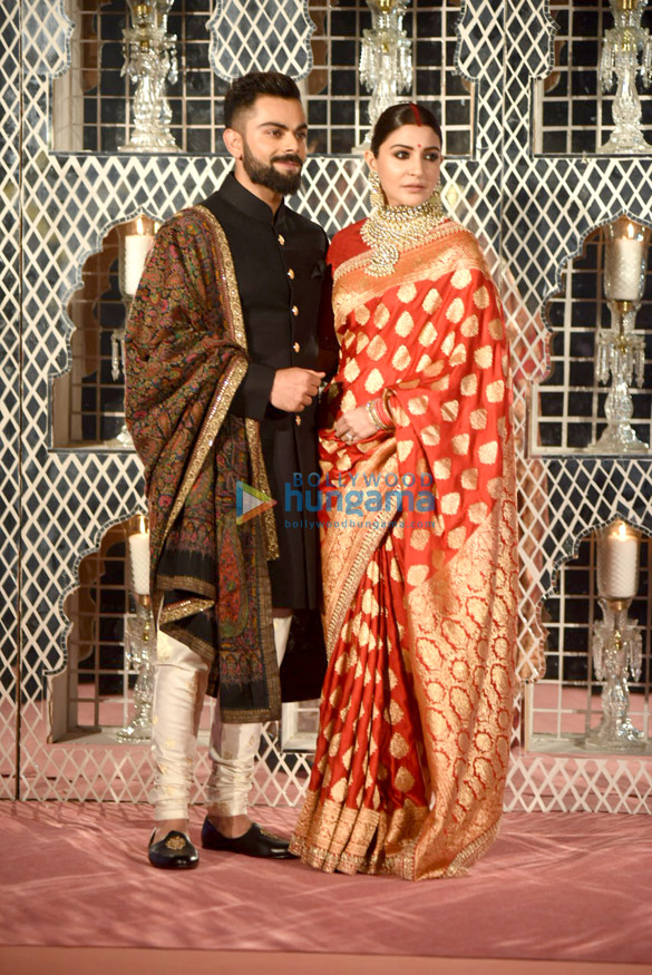virat kohli and anushka sharma snapped at their delhi wedding reception 3