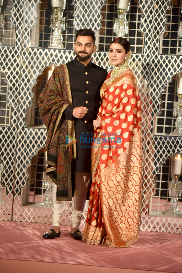 virat kohli and anushka sharma snapped at their delhi wedding reception 4