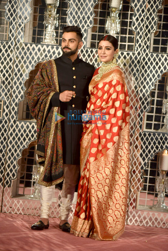 virat kohli and anushka sharma snapped at their delhi wedding reception 6